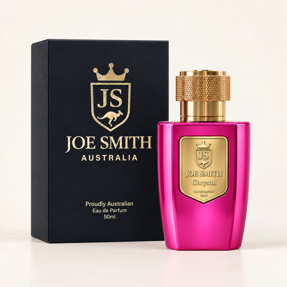 Joe Smith Chrystal 50 ml in the standard 50 ml bottle shape, with reflective pink finish, gold cap and gold plaque beside its presentation box
