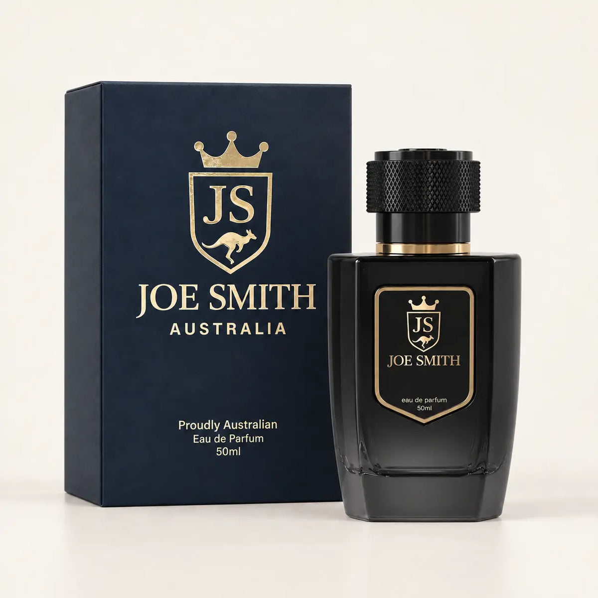 Joe Smith 50 ml black perfume bottle with black cap beside its navy presentation box