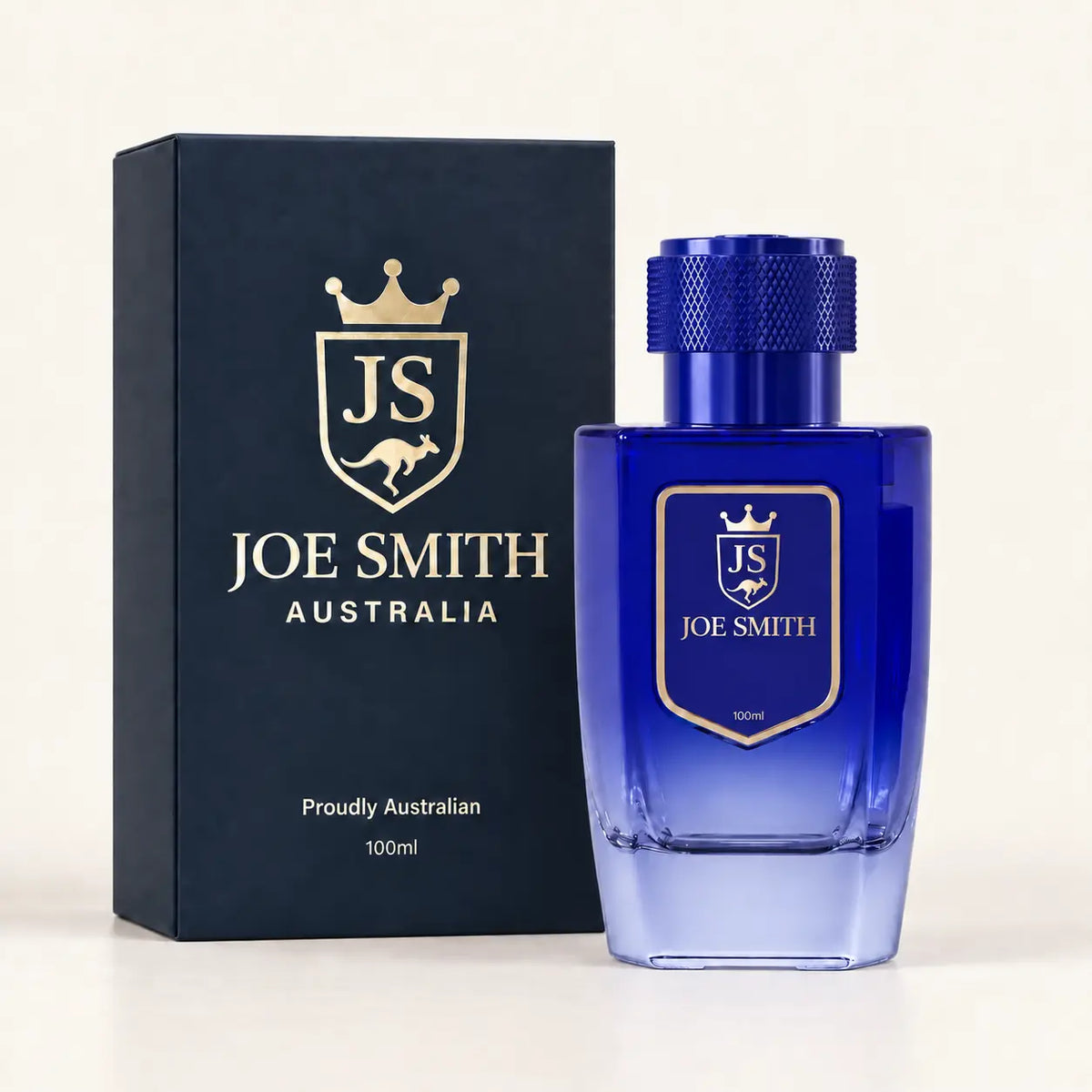 Joe Smith 100 ml royal blue perfume bottle with blue cap beside its navy presentation box