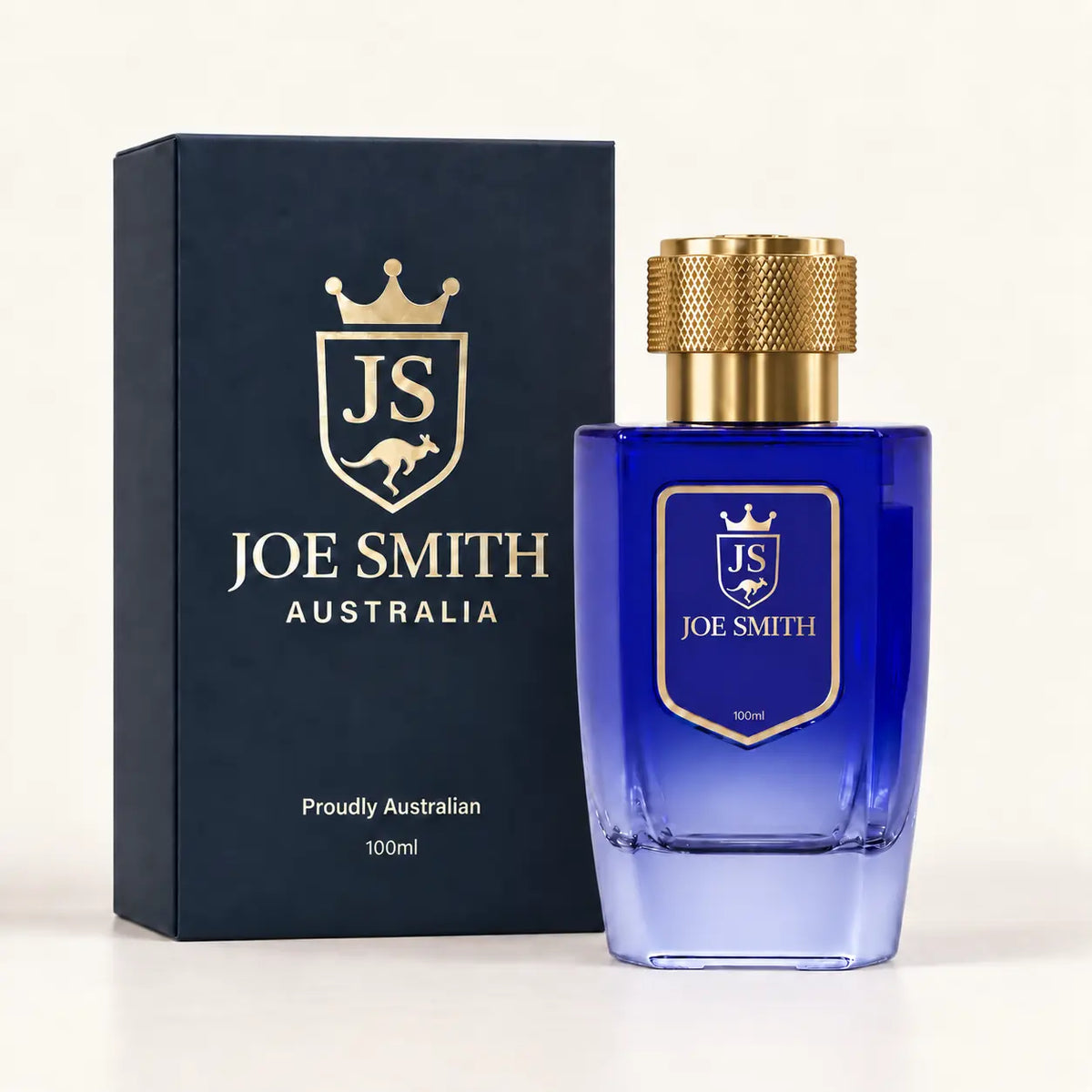 Joe Smith 100 ml royal blue perfume bottle with gold cap beside its navy presentation box