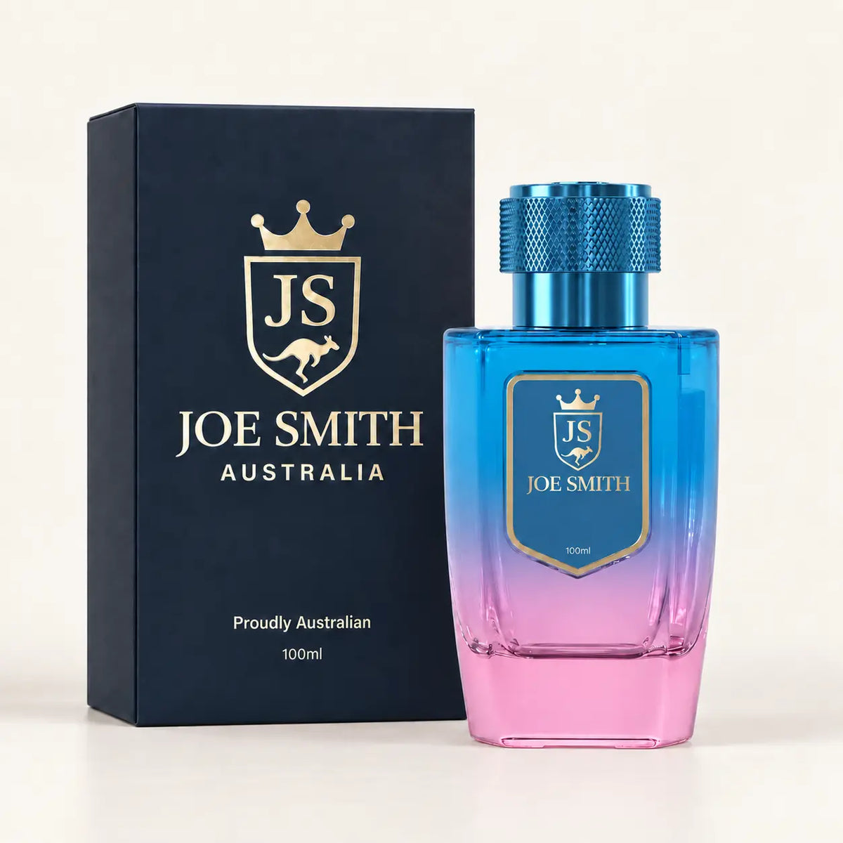 Joe Smith 100 ml blue-to-pink perfume bottle with blue cap beside its navy presentation box