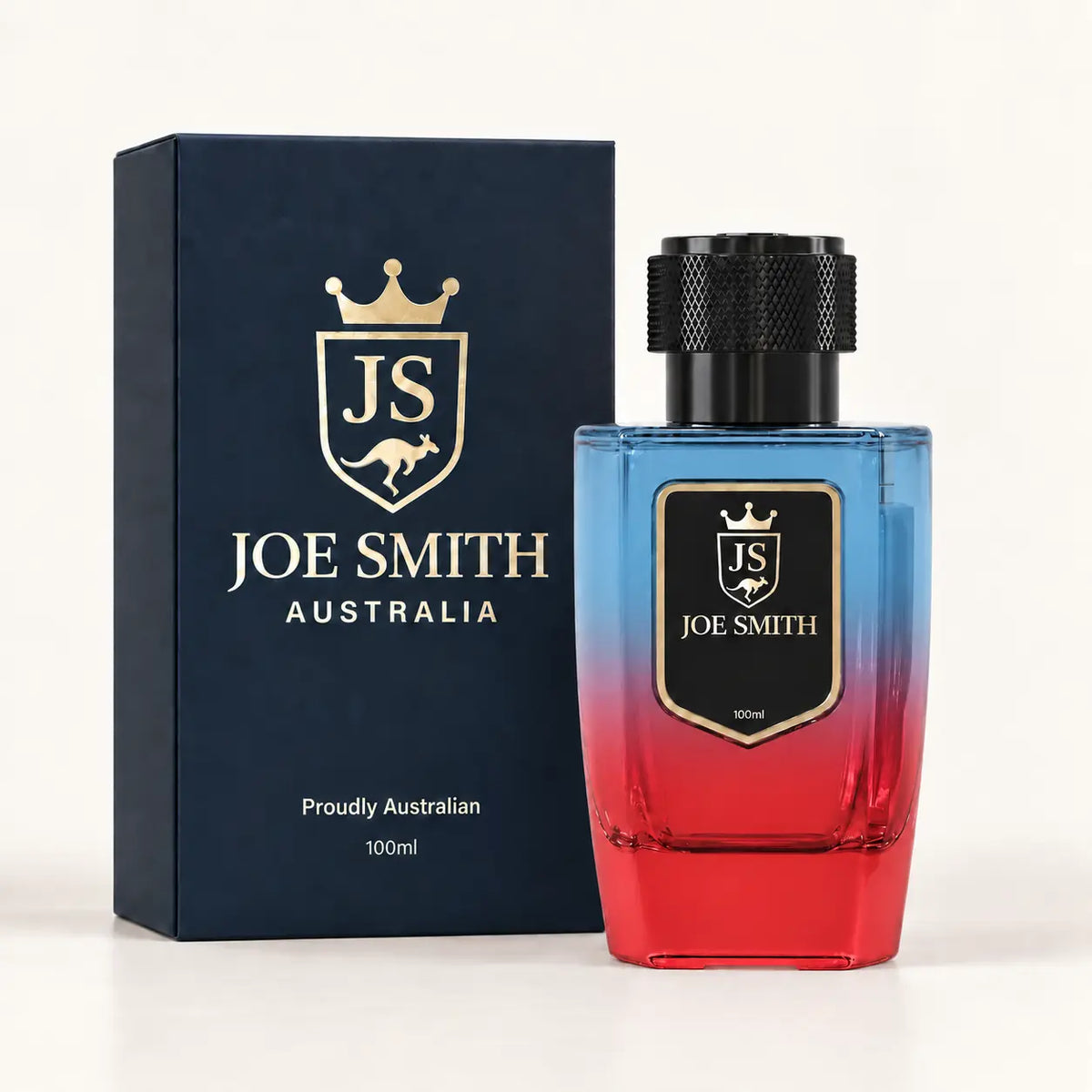 Joe Smith 100 ml blue-to-red perfume bottle with black cap beside its navy presentation box