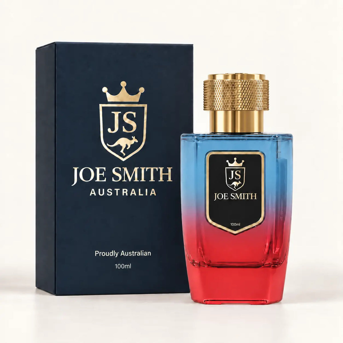 Joe Smith 100 ml blue-to-red perfume bottle with gold cap beside its navy presentation box