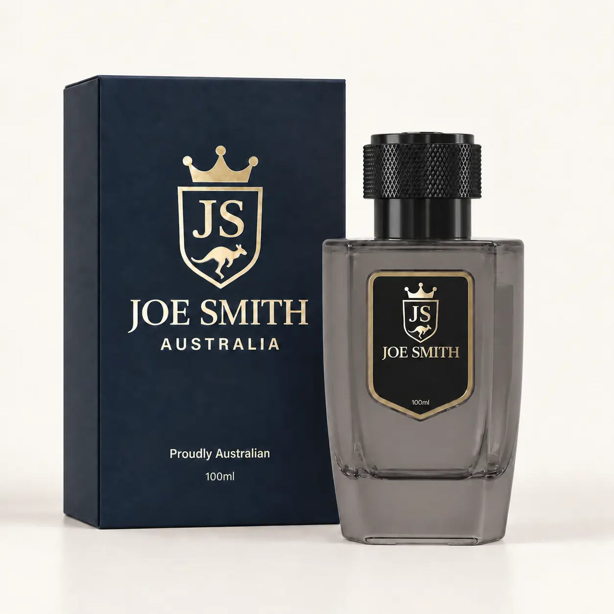 Joe Smith 100 ml smoky grey perfume bottle with black cap beside its navy presentation box
