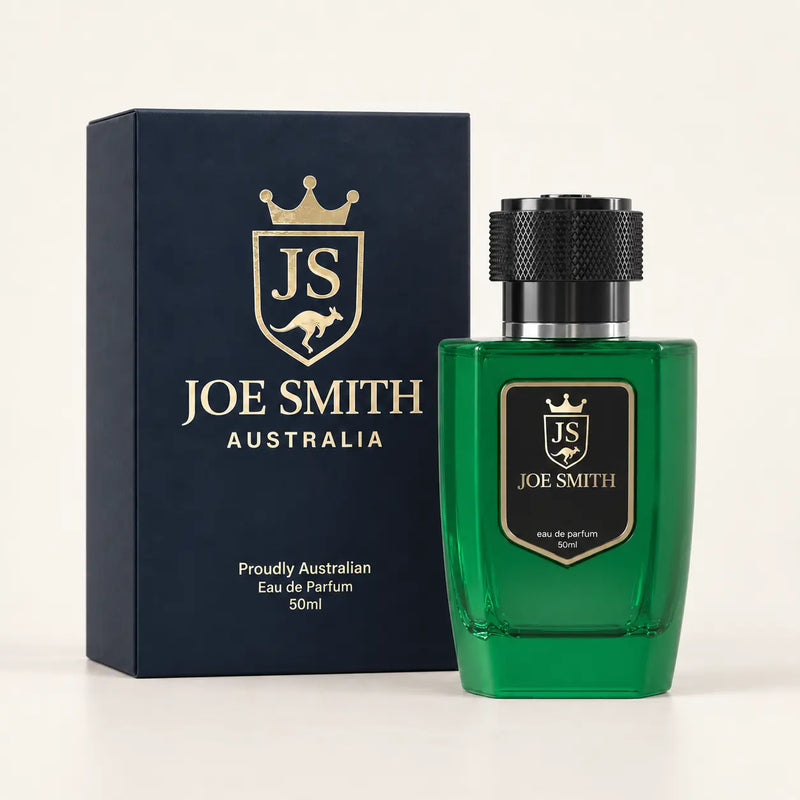 Joe Smith 50 ml green perfume bottle with black cap beside its navy presentation box